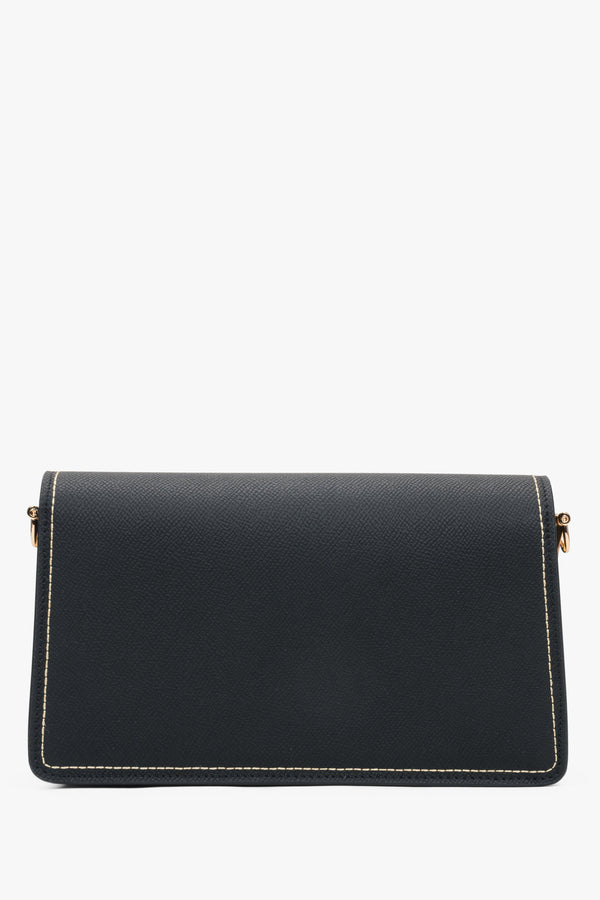 Elegant black women’s shoulder bag with gold details.