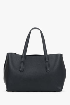 Spacious leather shoulder featuring one main compartment and two interior pockets.