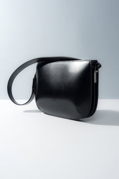 Timeless black leather shoulder bag, perfect for everyday outfits.