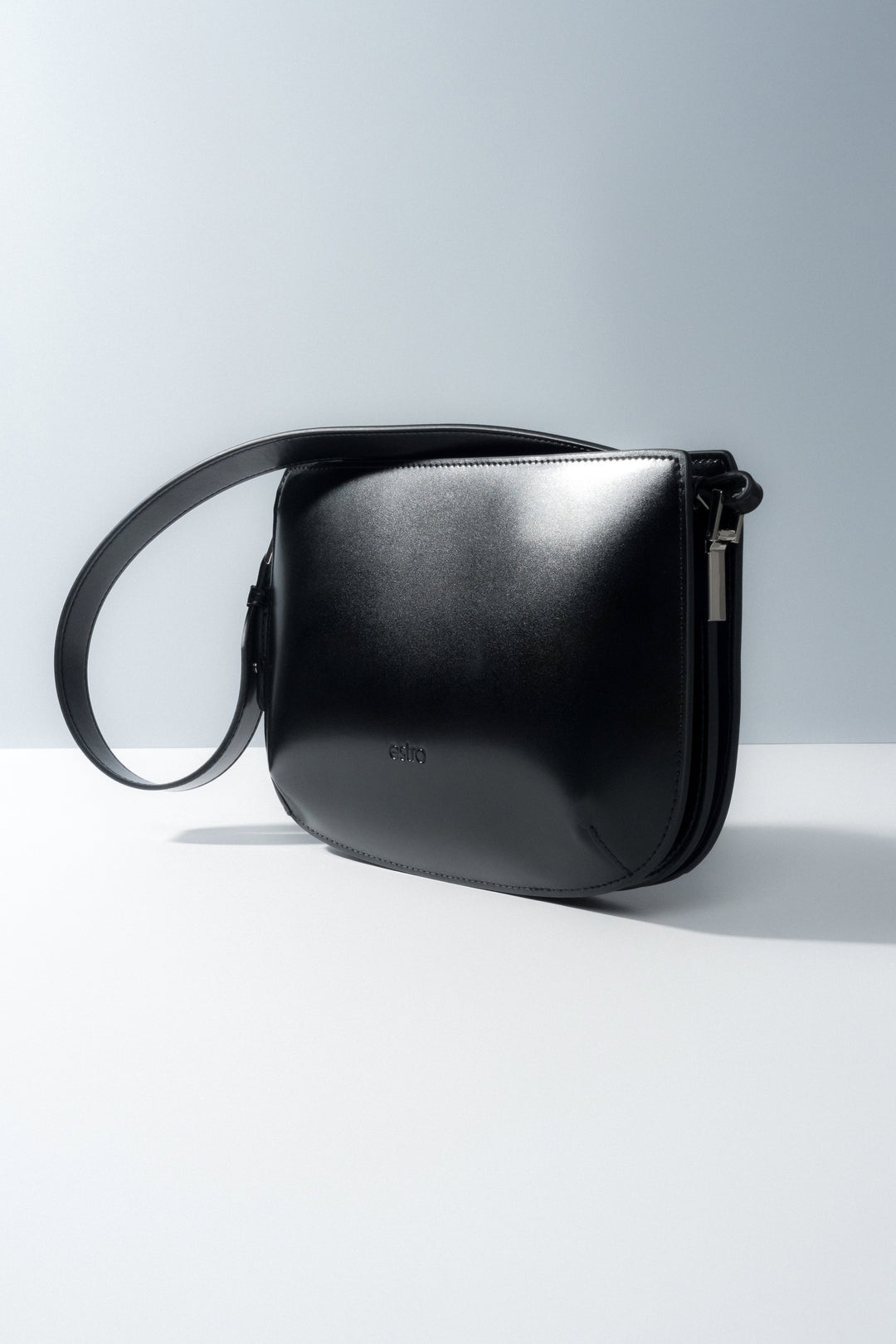 Timeless black leather shoulder bag, perfect for everyday outfits.