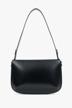 Classic black women’s bag with elegant design and comfortable shoulder strap.