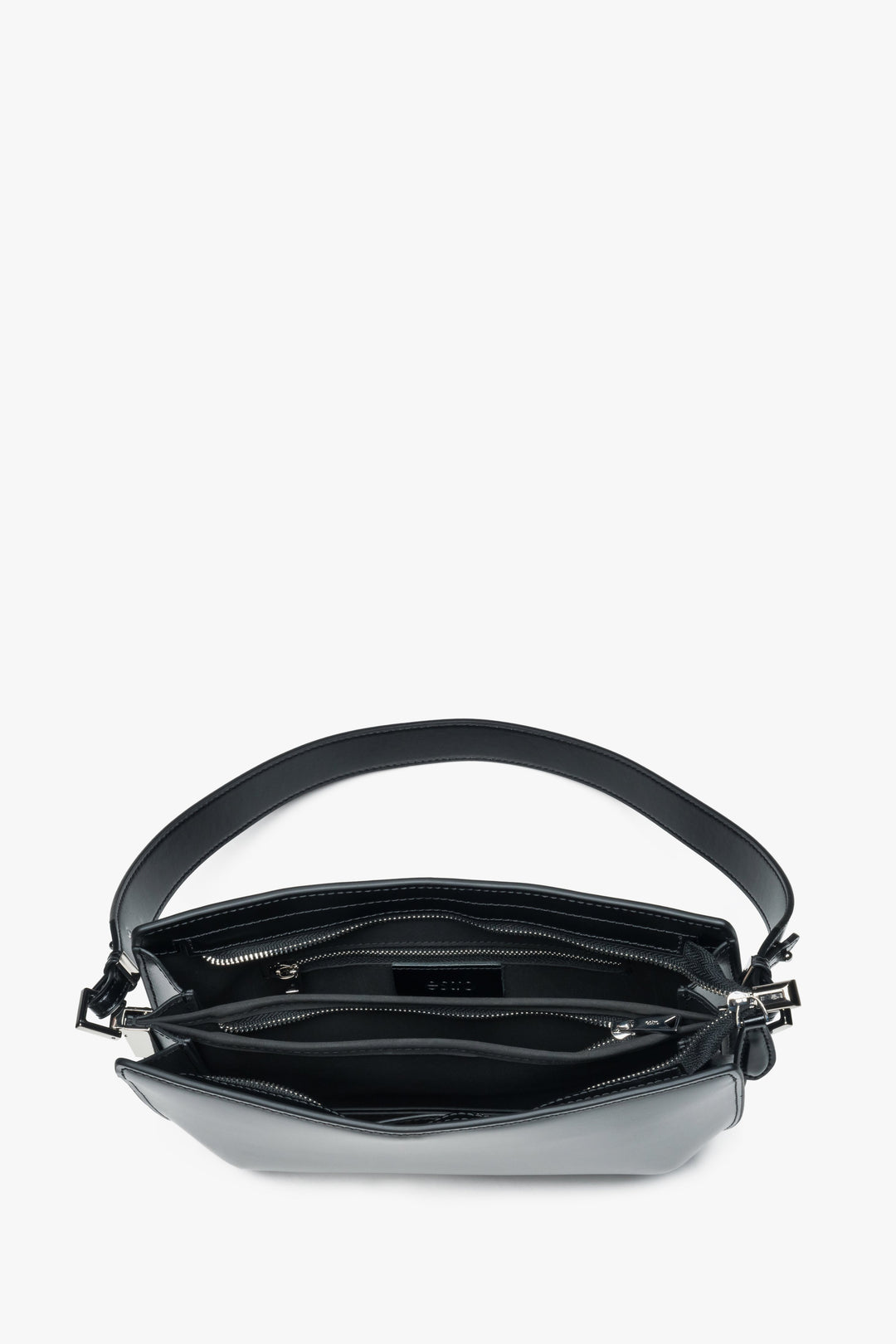 Minimalist leather shoulder bag in a sleek black finish.