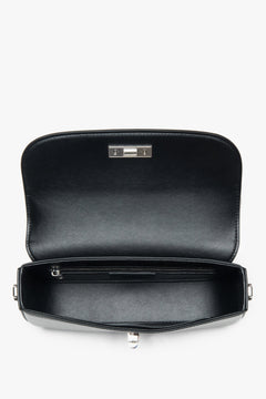 Women's elegant black smooth leather shoulder bag Estro - close-up of details and silver hardware.