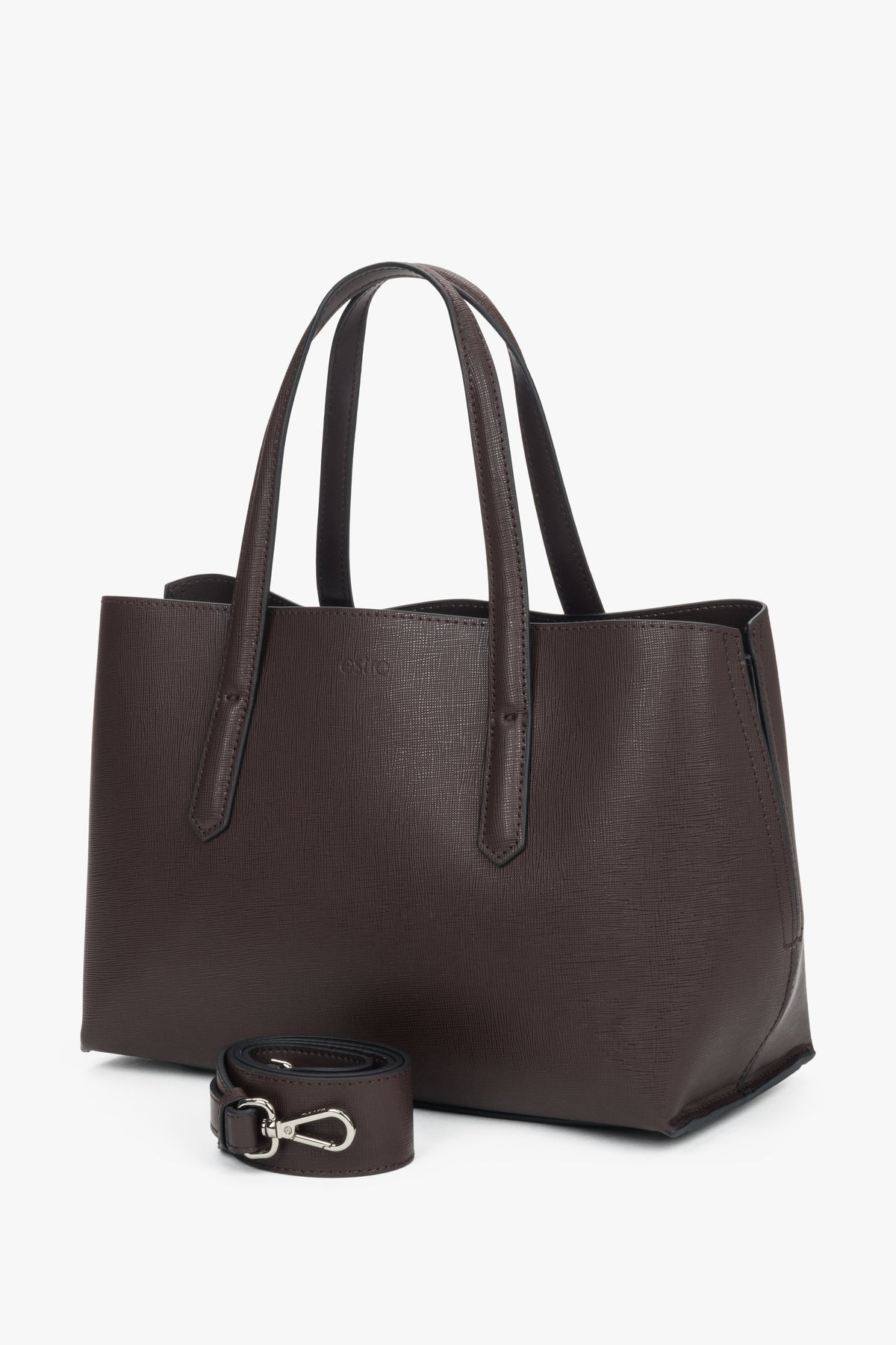 Dark brown women’s genuine leather tote bag with silver hardware and zip closure.