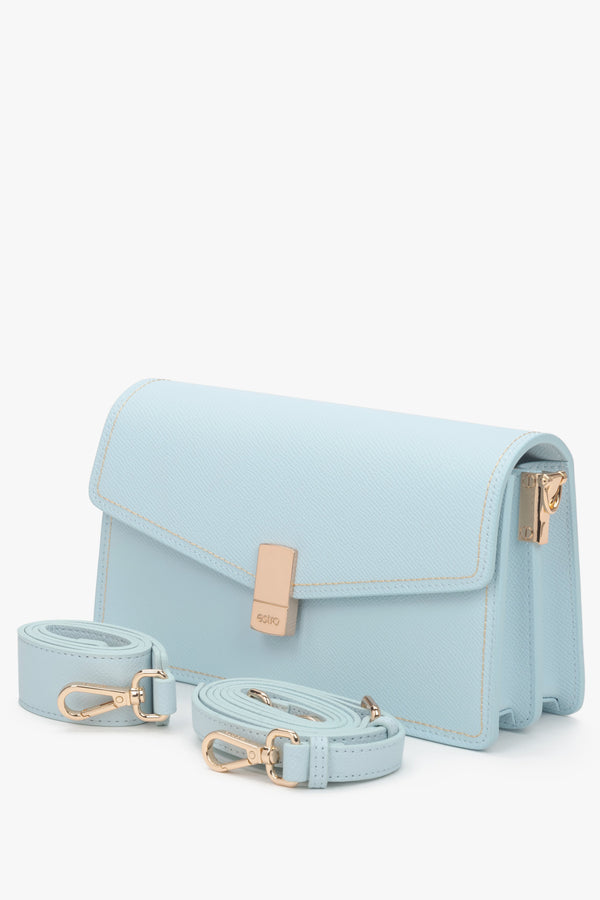 Small light blue leather crossbody bag for women with two adjustable straps.