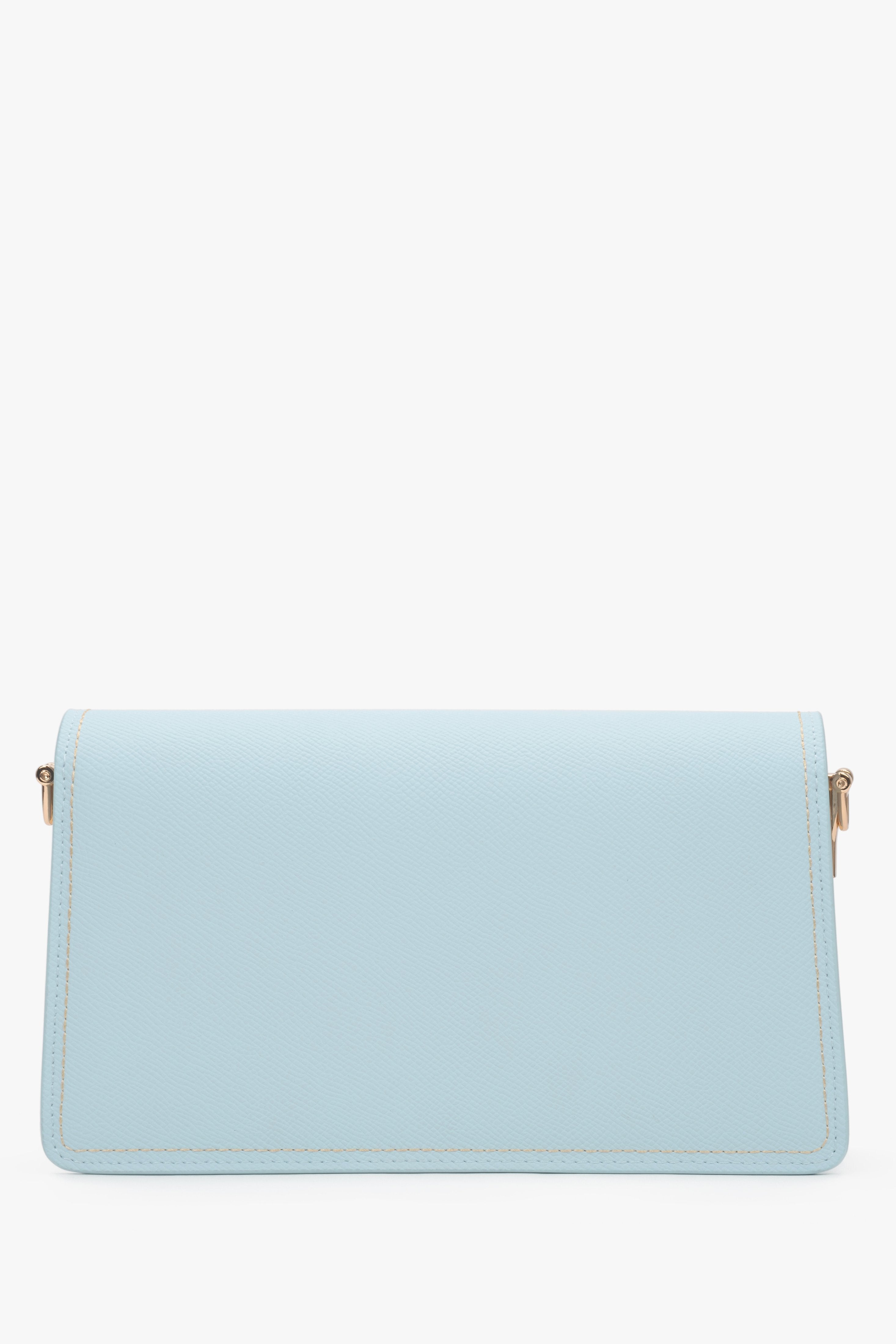 Elegant light blue leather bag featuring two compartments and gold hardware.