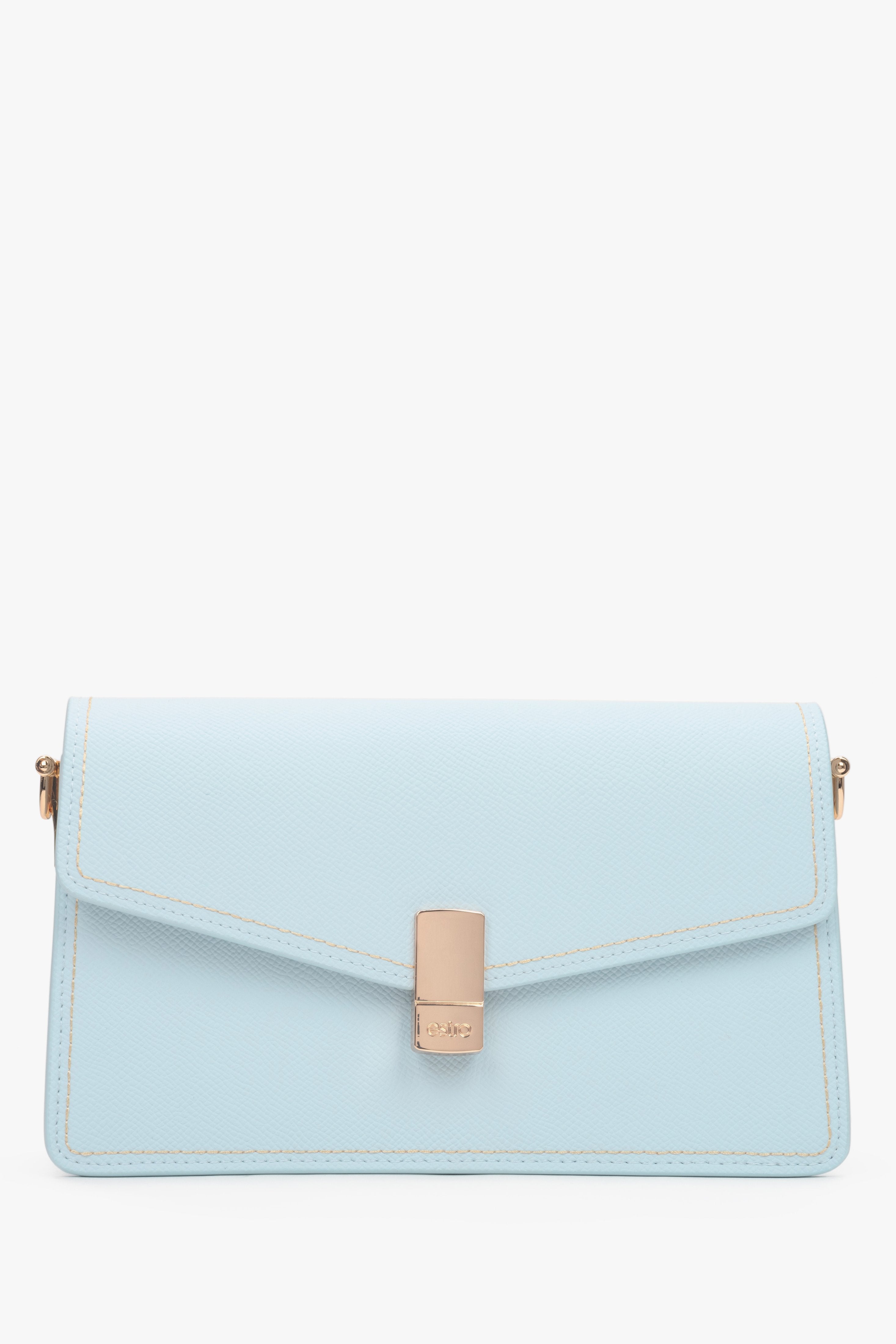 Compact light blue leather handbag for women with a functional zipper closure.