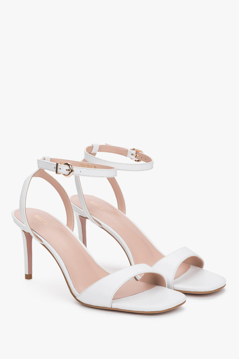 Women's white stiletto sandals.