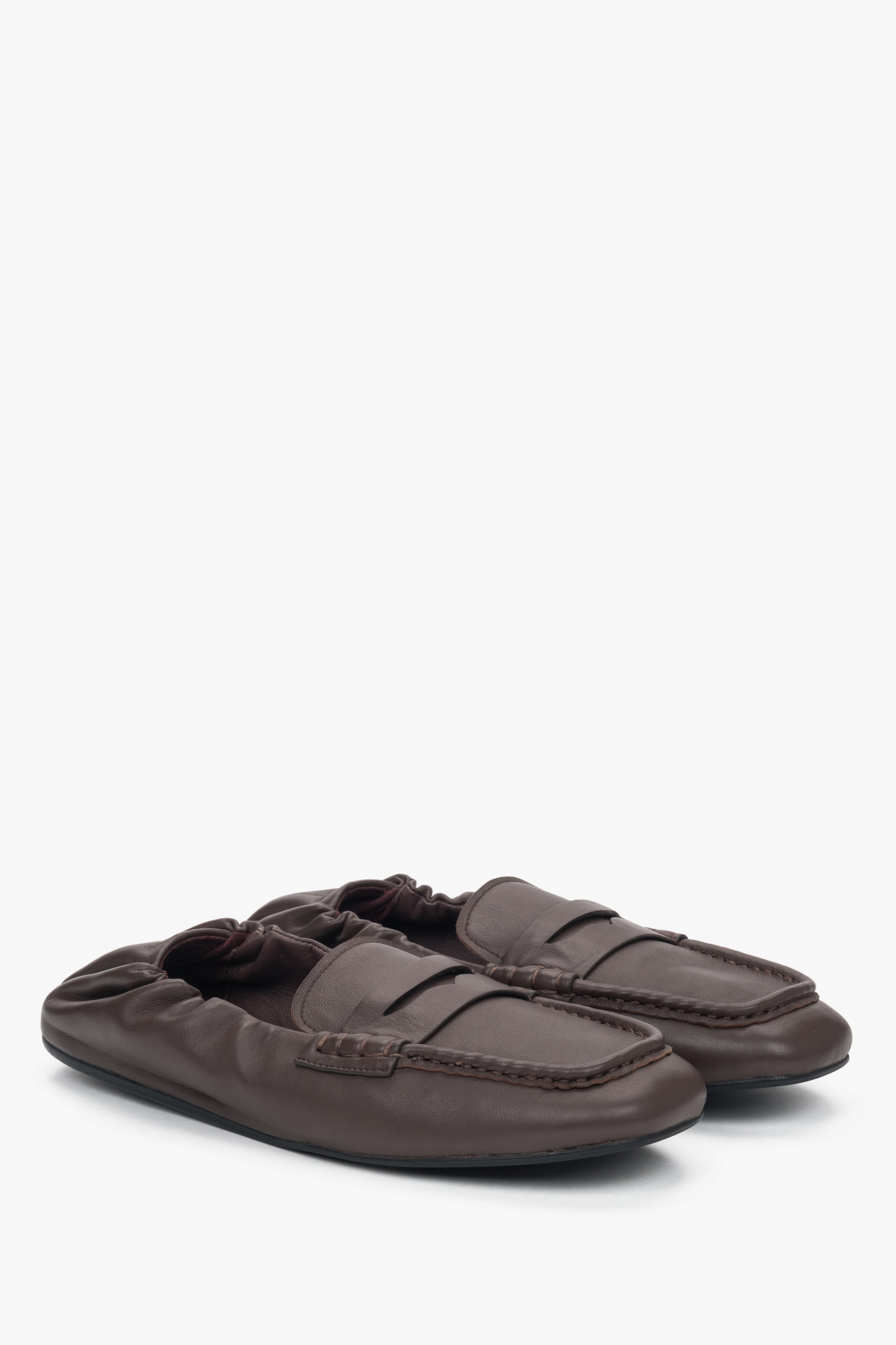 Flexible, dark brown women’s loafers with a soft heel.