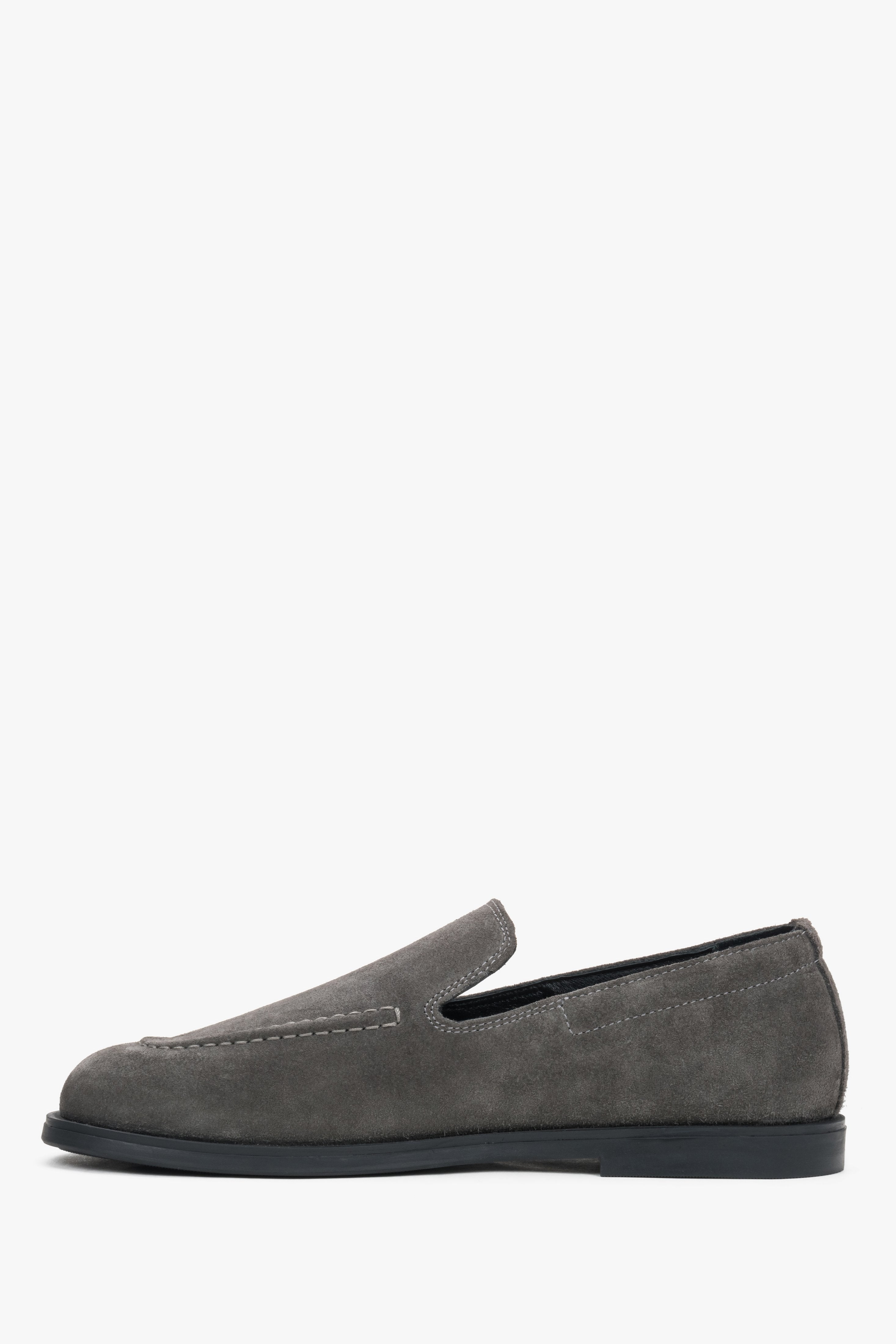 Close-up detail of the premium grey Italian velour and meticulous craftsmanship.