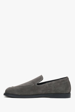 Close-up detail of the premium grey Italian velour and meticulous craftsmanship.