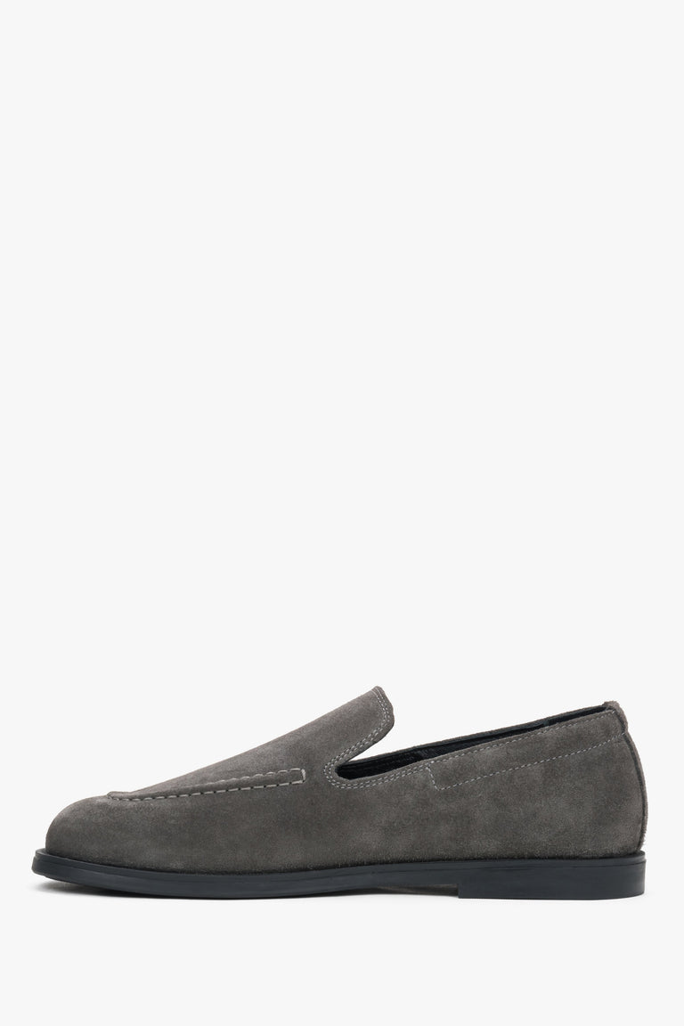 Close-up detail of the premium grey Italian velour and meticulous craftsmanship.