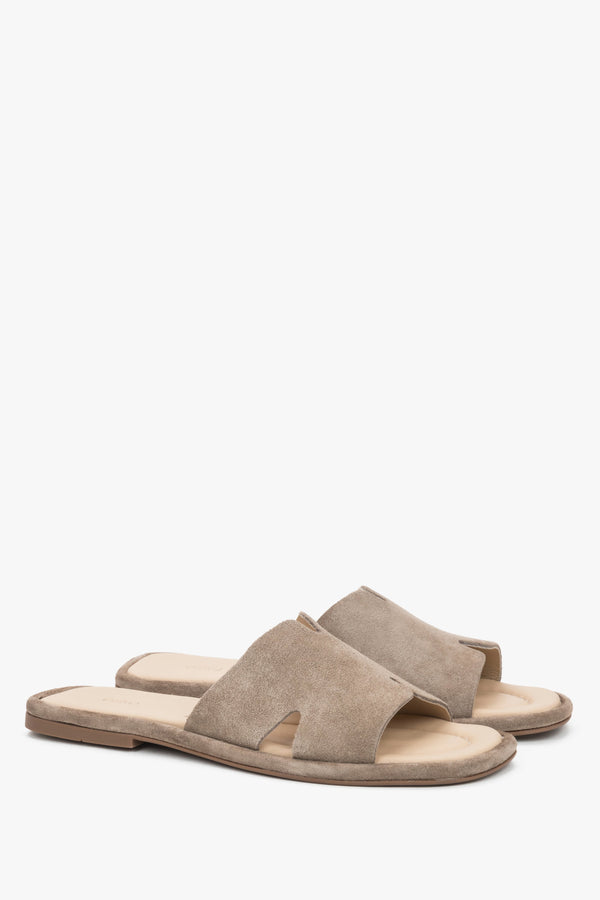 Taupe velour Estro mules, showcasing distinctive geometric cut-outs and the velvety texture of natural suede.