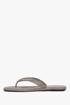 Women’s grey flip-flops made from soft genuine velour by Estro - side view.