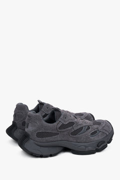 Women's grey velour platform sneakers – back view highlighting the stable heel support and geometric sole structure.
