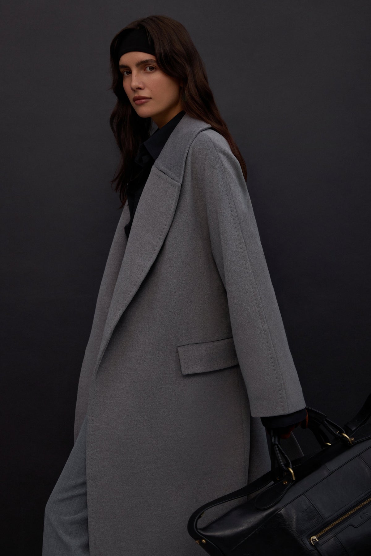 Grey women’s ankle-length coat with wool and wide collar.