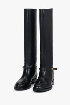 Women's high black genuine leather boots with a gold buckle Estro.