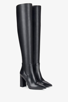 Black leather pointed knee-high boots Estro.