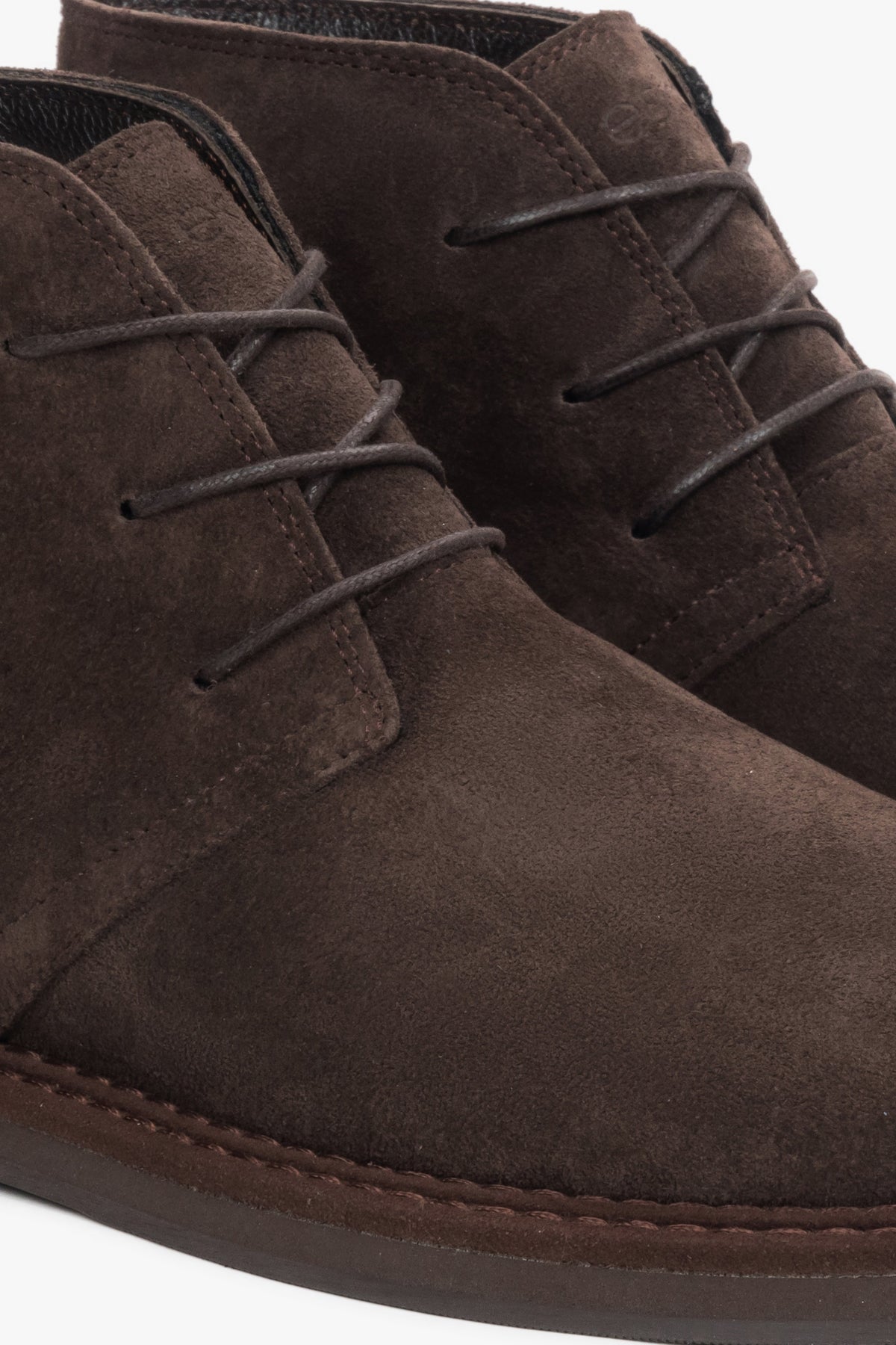 Lace-up women’s ankle boots made of dark brown genuine velour.