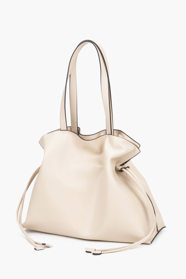 Large milky-beige women’s genuine leather shopper bag by Estro in a deep mocha shade, featuring a clean geometric silhouette with space for A4 documents