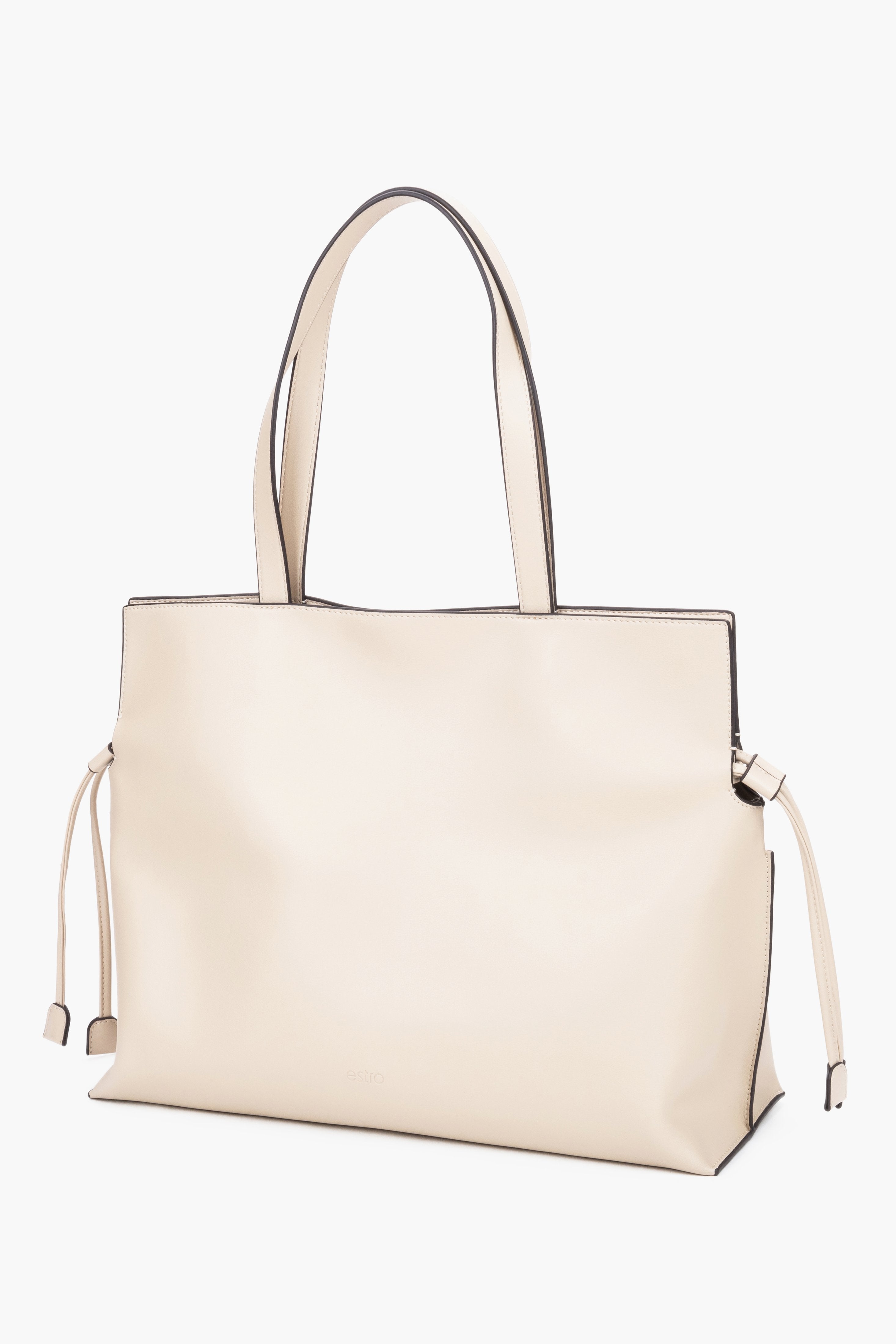 Leather shopper bag with a 14 cm width and loose side ties, showcasing the softness and refined texture of smooth genuine leather - milky-beige colour.