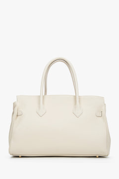 Side view showcasing the bag’s spacious design and depth, perfect for carrying A4 documents and daily essentials.