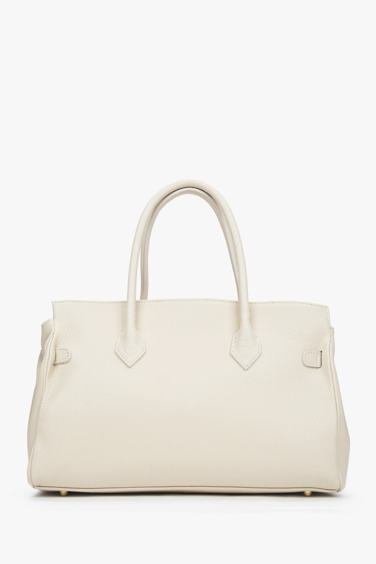 Side view showcasing the bag’s spacious design and depth, perfect for carrying A4 documents and daily essentials.