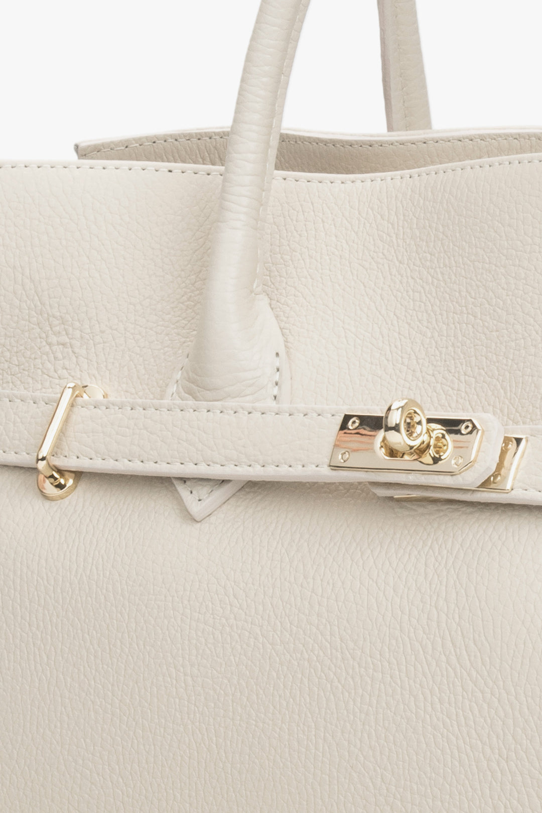 Close-up detail of the premium Italian leather and zip closure, emphasizing quality craftsmanship and refined texture.