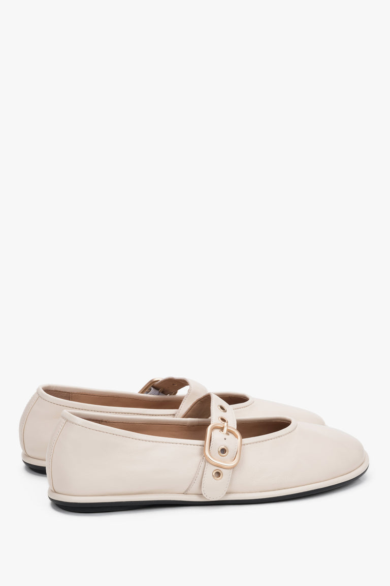 The back of the shoe showing the clean, precise stitching of the heel counter and the refined, minimalist silhouette.