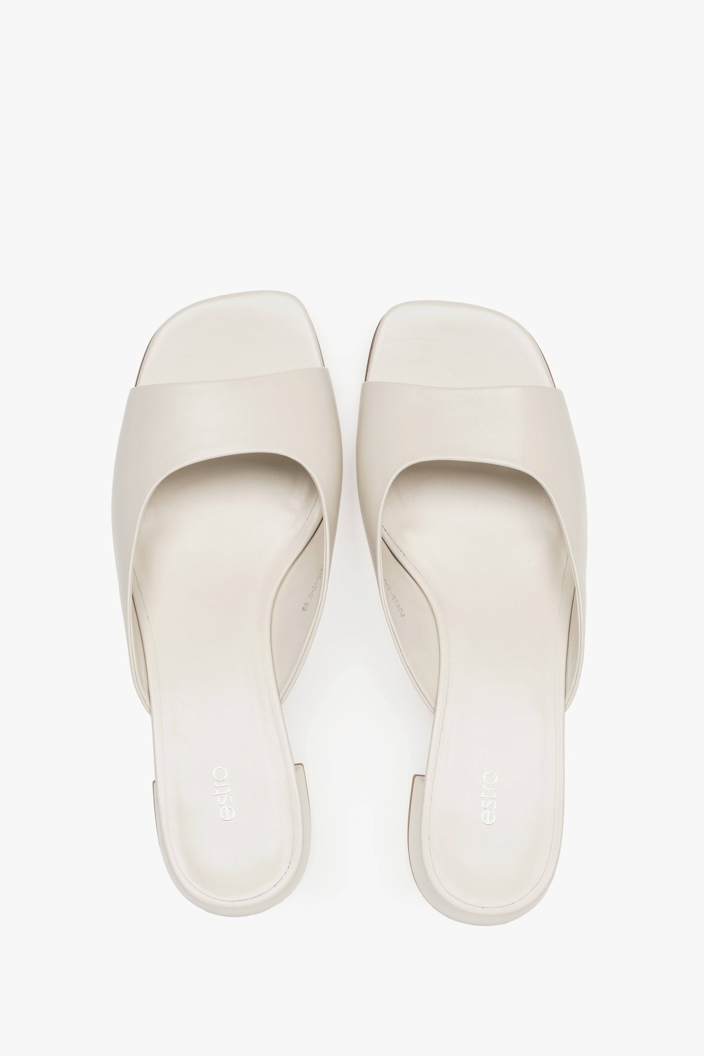 Estro women’s mules, white, made of genuine leather, with a low heel.