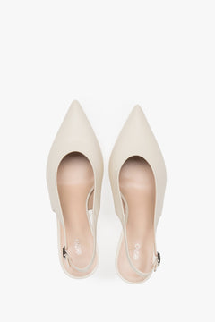 Elegant light beige leather slingback shoes for women.