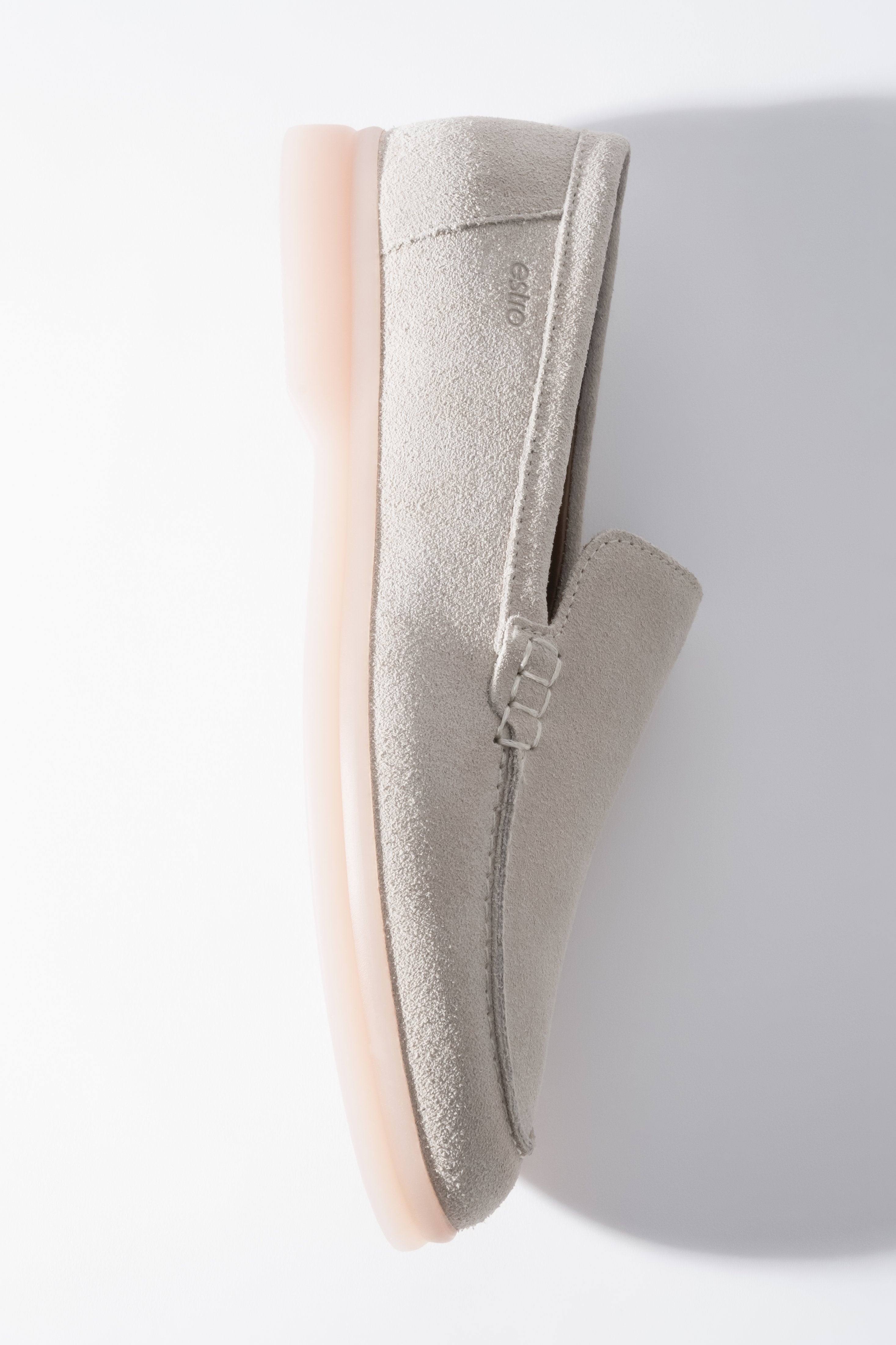 Light beige women’s loafer shoes made of natural velour leather by Estro.