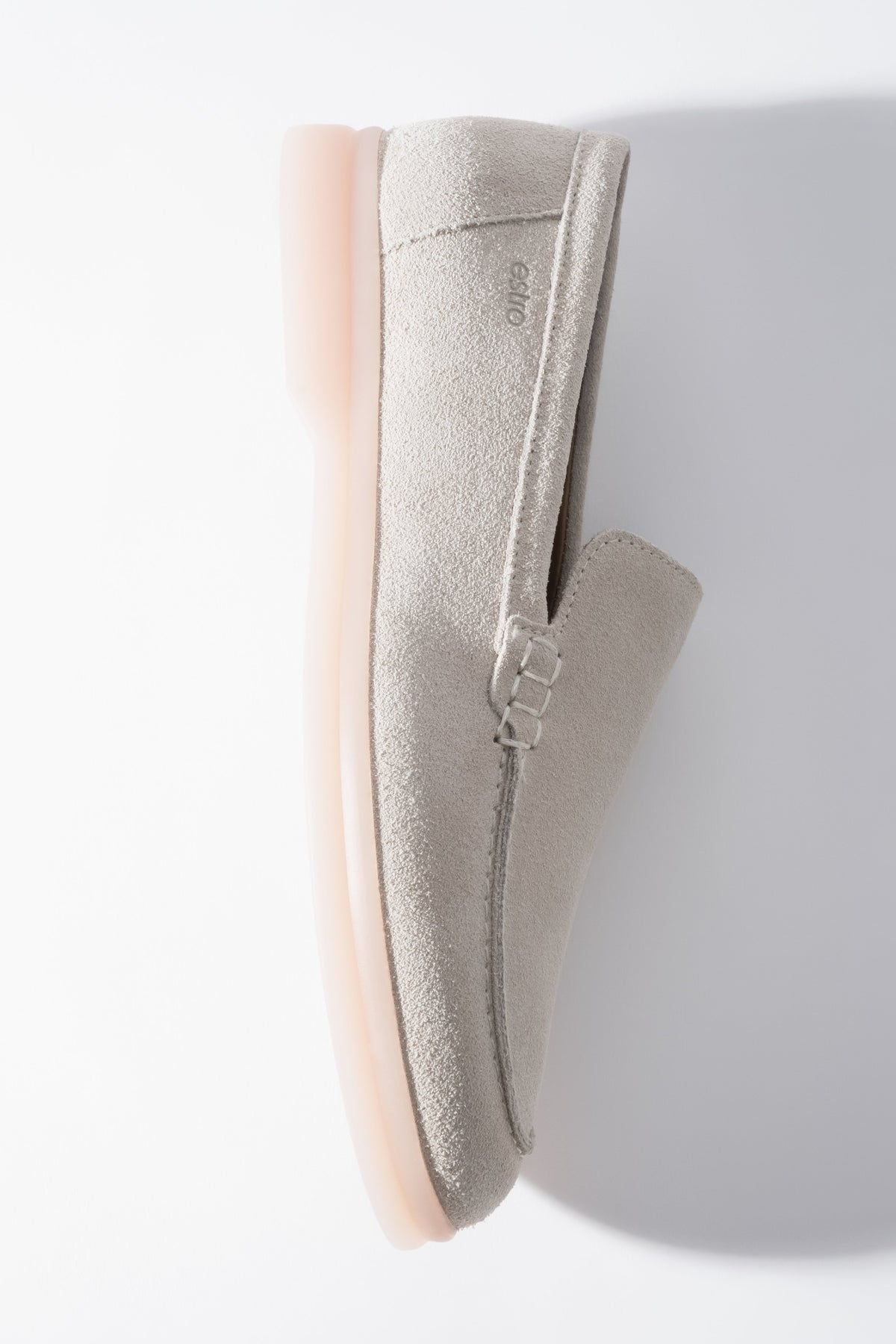 Light beige women’s loafer shoes made of natural velour leather by Estro.