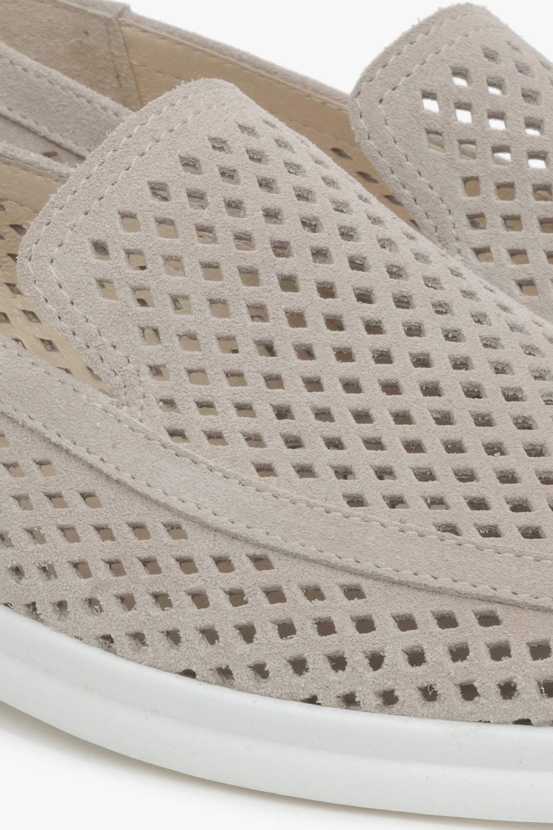 Light beige women's moccasins with perforation made of Premium Italian velour – details.