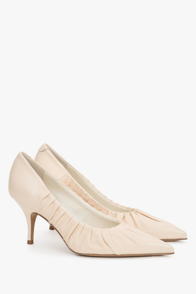 Women's light beige premium Italian leather pumps by Guglielmo Rotta with a gathered edge.