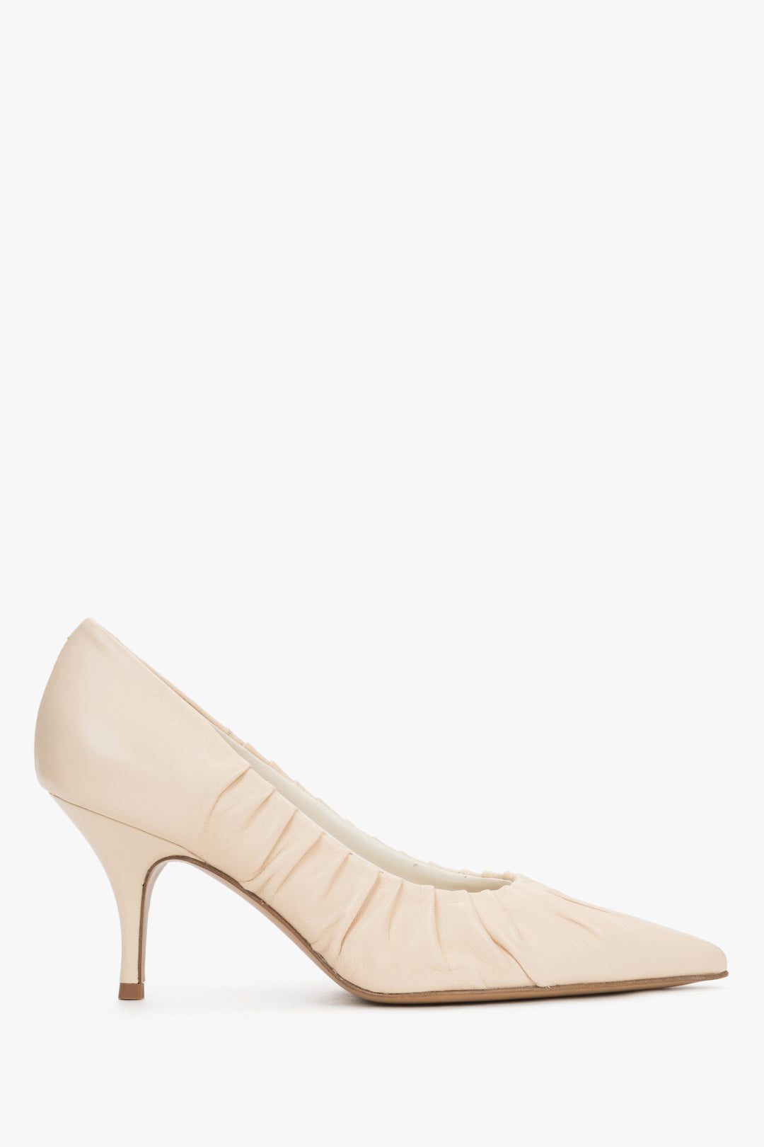 Elegant nude pointed-toe stilettos featuring a unique ruched detail, Guglielmo Rotta.