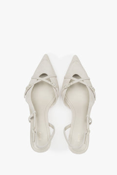 Women's light beige velour low heel slingback shoes by Estro.