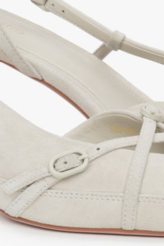 Estro light beige velour slingbacks with a low heel for women.