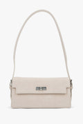 Women's light beige velour shoulder bag by Estro