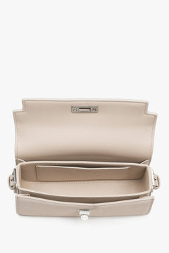 Interior view of women's light beige velour shoulder bag by Estro