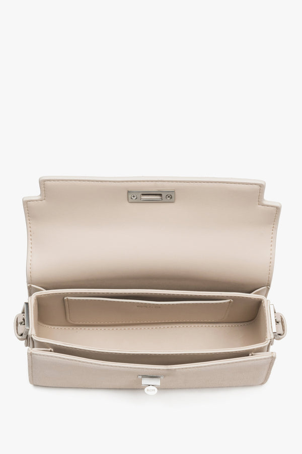 Interior view of women's light beige velour shoulder bag by Estro