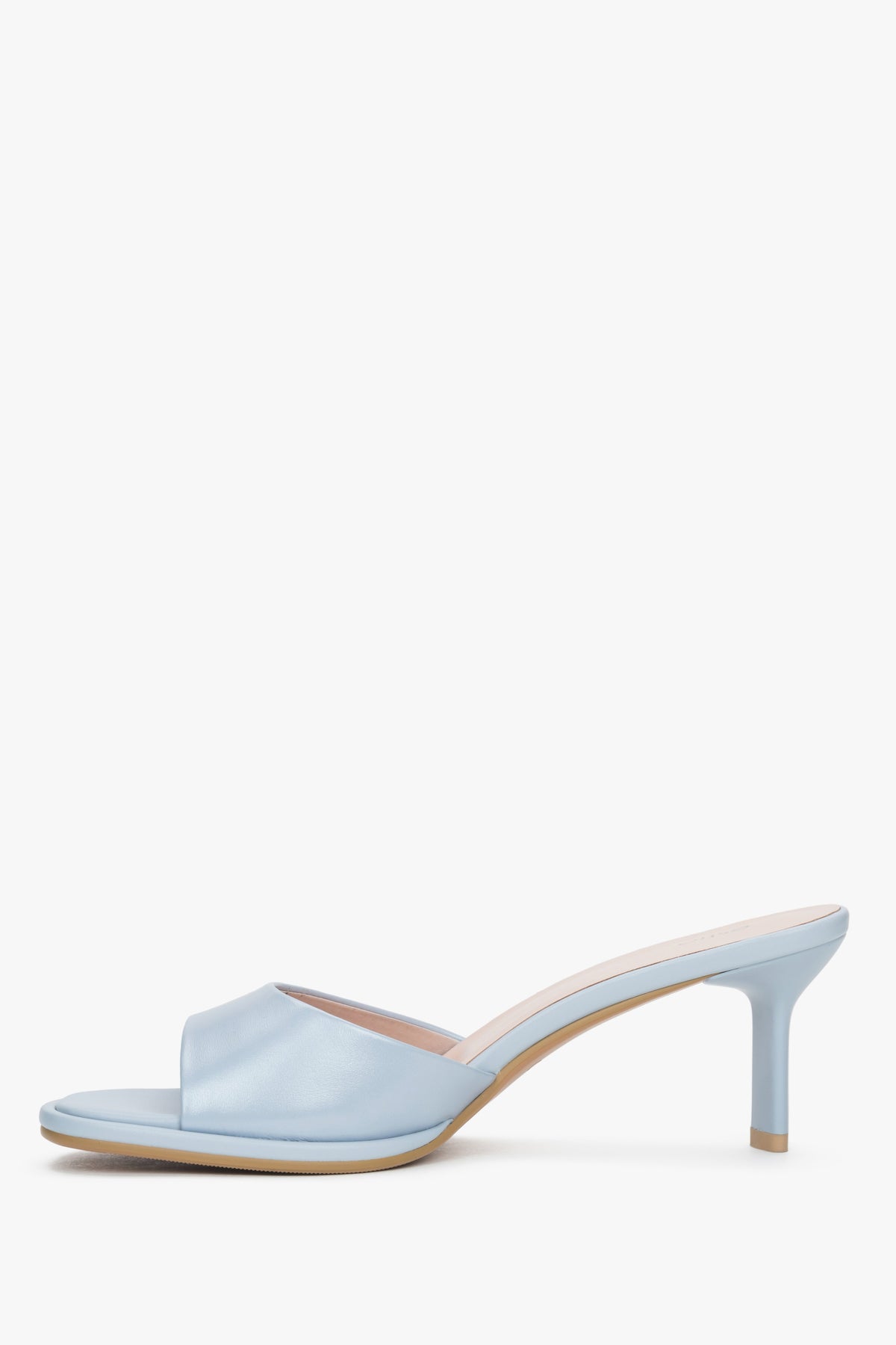 Light blue heeled mules made of genuine leather.