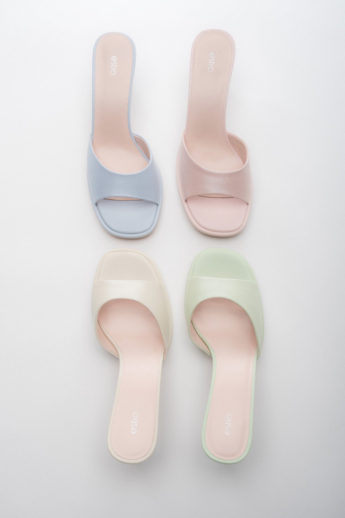 Women’s leather heeled mules – color options.