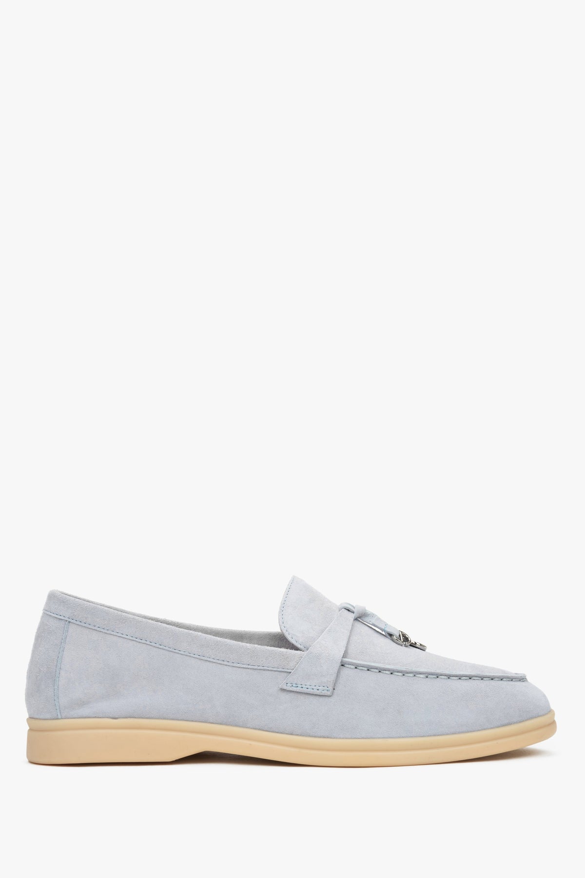 Light blue women’s loafers made of natural velour.
