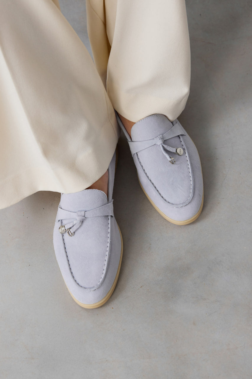 Stylish light blue tassel loafers for women in premium velour by Estro, featuring classic detailing and a comfortable slip-on design.