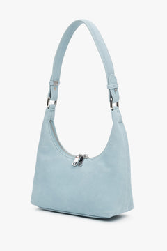 Light blue women's half-moon shoulder bag made of natural velour.