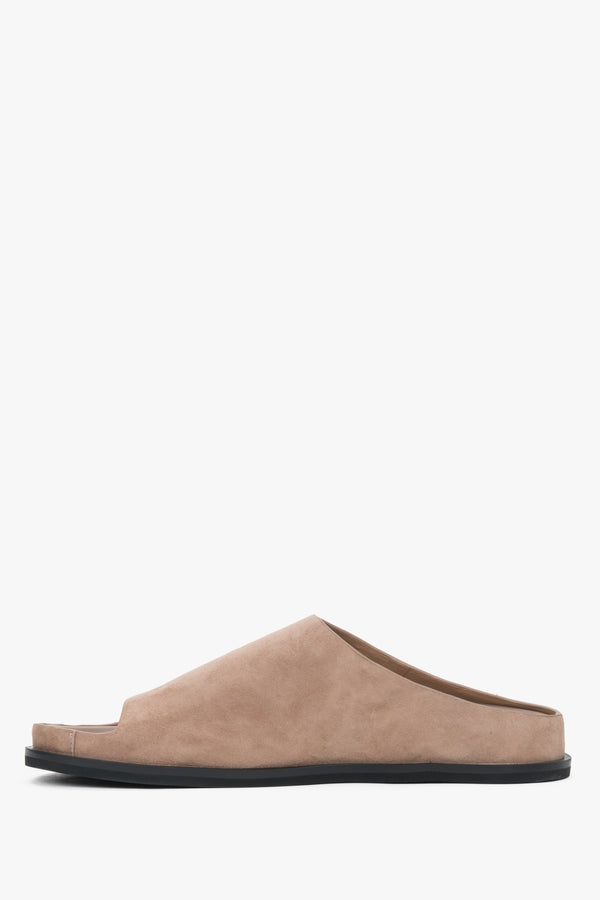 Light brown women’s velour slide sandals on a flat sole.