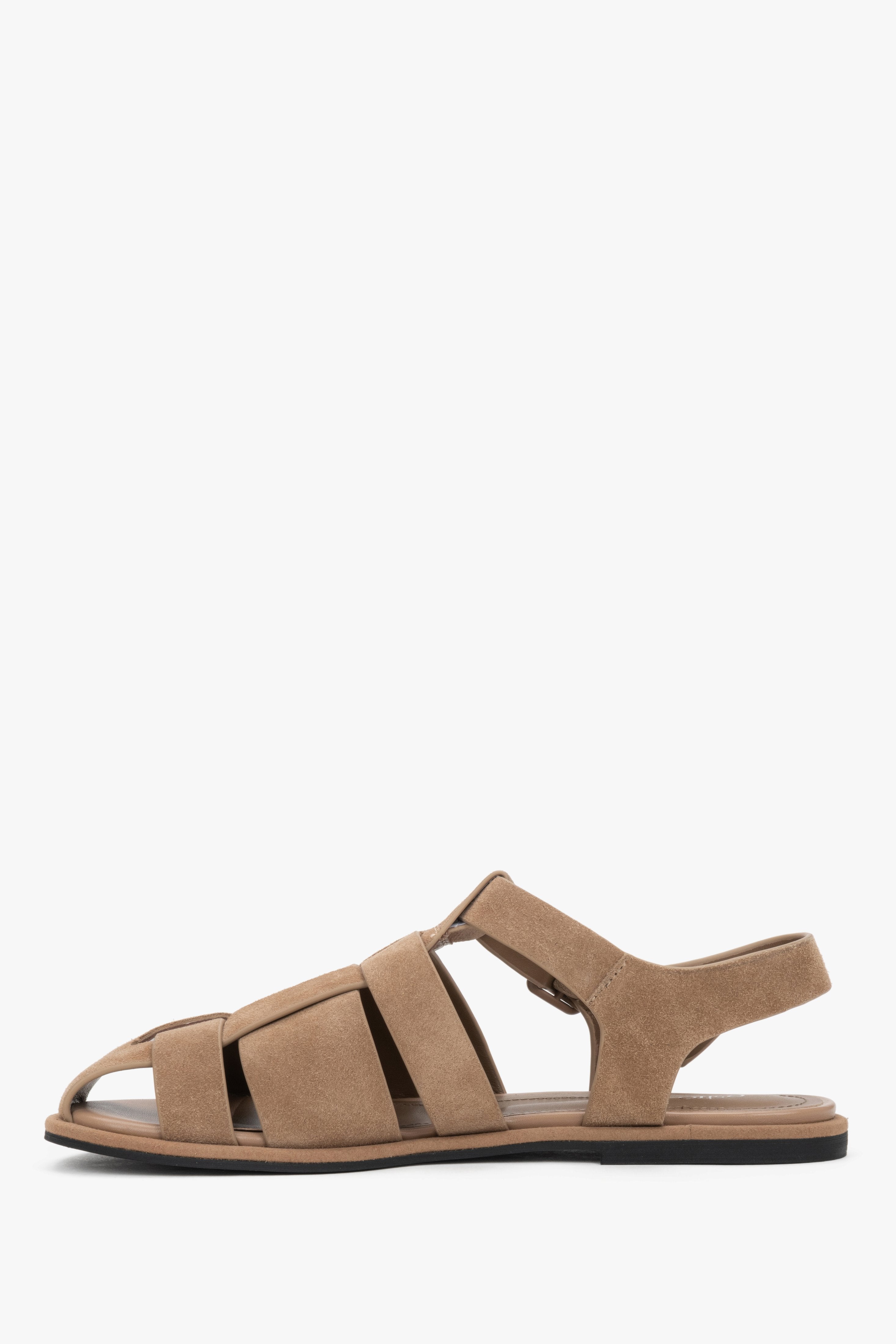 Elegant tan velour sandals with a soft leather interior and flat heel.