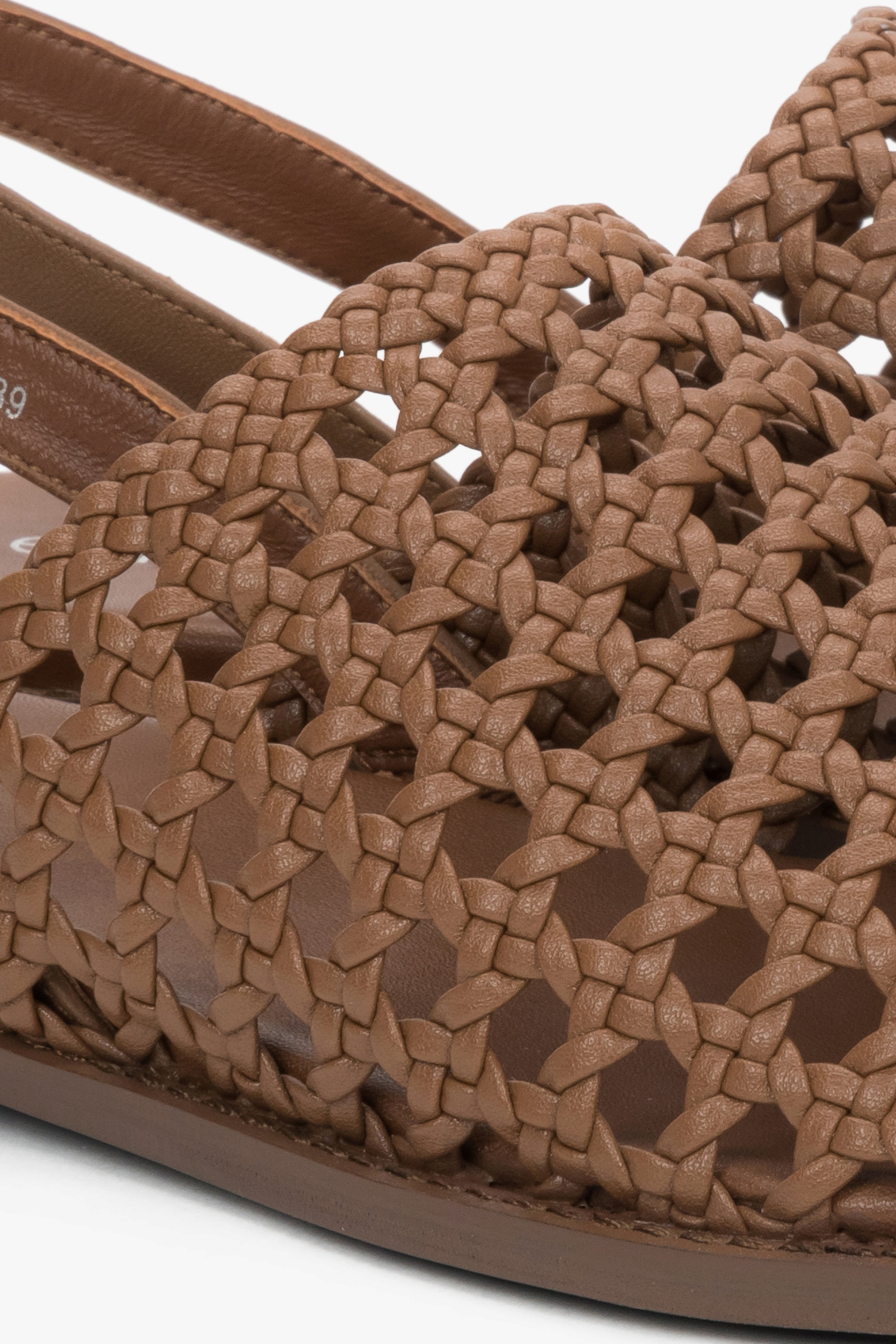 Genuine leather tan sandals with a breathable perforated upper.