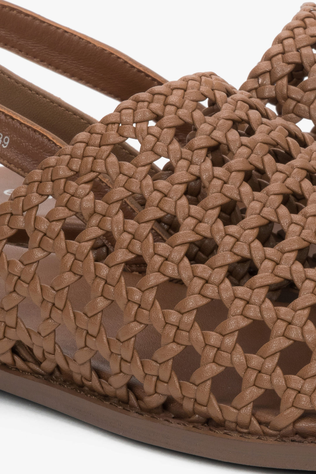 Genuine leather tan sandals with a breathable perforated upper.